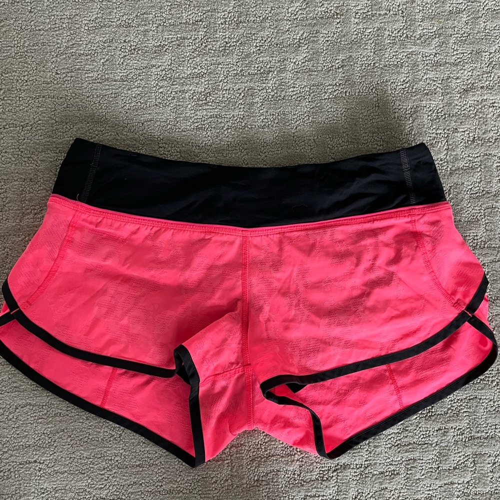 Bright pink Lululemon lined running shorts- size 6